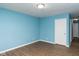 Light blue bedroom with wood floors at 1130 W 33Rd St, Indianapolis, IN 46208