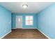 Light blue living room with wood floors at 1130 W 33Rd St, Indianapolis, IN 46208