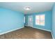 Light blue living room with wood floors at 1130 W 33Rd St, Indianapolis, IN 46208
