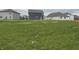 Expansive backyard with a lush lawn and views of neighboring homes, perfect for outdoor enjoyment at 116 Marble Wood Dr, Danville, IN 46122