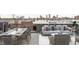 Rooftop deck with city views, seating, and dining area at 1234 Alabama St, Indianapolis, IN 46202