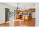 Eat-in kitchen with stainless steel appliances, a large island, and a sliding glass door to the deck at 14928 Declaration Dr, Westfield, IN 46074