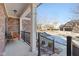 Cozy covered front porch featuring a wooden swing, brick columns and access to a beautifully landscaped yard at 14928 Declaration Dr, Westfield, IN 46074