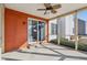 View of sunroom area with an orange wall and screened windows at 14928 Declaration Dr, Westfield, IN 46074