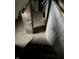 Unfinished basement with brick column and concrete walls at 239 Iowa St, Indianapolis, IN 46225