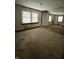 A bedroom with damaged walls and tiled floor at 239 Iowa St, Indianapolis, IN 46225