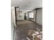 Under renovation, this room has exposed walls and floors at 239 Iowa St, Indianapolis, IN 46225