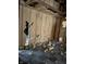 Damaged interior walls and floor requiring extensive renovations at 243 E Caven St, Indianapolis, IN 46225