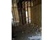 Under construction interior with exposed framing and insulation at 243 E Caven St, Indianapolis, IN 46225