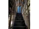 Unfinished staircase leading to upper level; shows potential for renovation at 243 E Caven St, Indianapolis, IN 46225