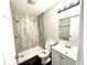 Updated bathroom with walk-in shower and modern vanity at 5619 Pappas Dr, Indianapolis, IN 46237