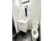 Bathroom with updated vanity and toilet at 5619 Pappas Dr, Indianapolis, IN 46237