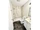 Clean bathroom, featuring a shower/tub combo and updated fixtures at 5619 Pappas Dr, Indianapolis, IN 46237