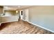 Dining area with hardwood floors and kitchen views at 5619 Pappas Dr, Indianapolis, IN 46237