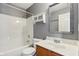 Clean bathroom with tub, shower, and wood vanity at 6350 W Chelmsford Dr, McCordsville, IN 46055