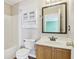 Clean bathroom with a shower/tub combo and wood vanity at 6350 W Chelmsford Dr, McCordsville, IN 46055