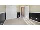 Bedroom with double door closet and access to hallway at 6350 W Chelmsford Dr, McCordsville, IN 46055
