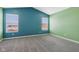 Bedroom with two-toned walls and grey carpet at 6350 W Chelmsford Dr, McCordsville, IN 46055
