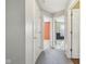 Bright hallway with grey carpet and access to bedrooms at 6350 W Chelmsford Dr, McCordsville, IN 46055