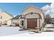 Two story house exterior with snow covered backyard at 6350 W Chelmsford Dr, McCordsville, IN 46055