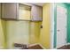 Laundry room with upper cabinets and space for washer/dryer at 6350 W Chelmsford Dr, McCordsville, IN 46055