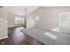 Spacious living room with hardwood floors and carpeted area at 6350 W Chelmsford Dr, McCordsville, IN 46055