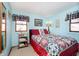 Charming bedroom with a quilt bedspread and a lakeside theme at 7018 Drum Dr, Nineveh, IN 46164