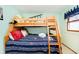 Cozy bedroom with a bunk bed and colorful bedding at 7018 Drum Dr, Nineveh, IN 46164