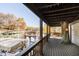 Covered deck with lake views and fall colors at 7018 Drum Dr, Nineveh, IN 46164