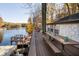 Lakefront deck with picnic table and fall foliage views at 7018 Drum Dr, Nineveh, IN 46164