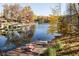 Private dock with seating area overlooking calm lake water at 7018 Drum Dr, Nineveh, IN 46164