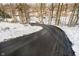 Curving driveway leading to home, snow on ground at 7018 Drum Dr, Nineveh, IN 46164
