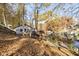 Lakefront home with large deck and beautiful fall colors at 7018 Drum Dr, Nineveh, IN 46164