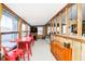 Open living space with a fireplace, large windows, and a cozy atmosphere at 7018 Drum Dr, Nineveh, IN 46164