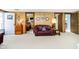 Living room with wood paneling and access to bedrooms at 7018 Drum Dr, Nineveh, IN 46164