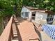 Spacious outdoor deck with lake view and comfortable seating, perfect for relaxation and gatherings at 7018 Drum Dr, Nineveh, IN 46164