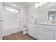 All white bathroom featuring double vanity with white quartz countertops, toilet, and tub/shower combo at 7164 Firestone Rd, Whitestown, IN 46052