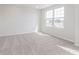 Bedroom featuring natural lighting and carpeted floors at 7164 Firestone Rd, Whitestown, IN 46052