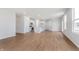 Open-concept living space featuring a stylish kitchen with stainless steel appliances and ample counter space at 7164 Firestone Rd, Whitestown, IN 46052