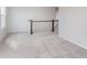Upstairs loft with railing and carpeted floors at 7164 Firestone Rd, Whitestown, IN 46052