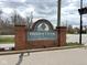 The Hidden Creek Condominiums community sign in brick at 8104 Glenwillow Ln # 208, Indianapolis, IN 46278