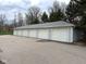 Multiple well-kept garages for residents, providing convenient parking and storage at 8104 Glenwillow Ln # 208, Indianapolis, IN 46278