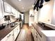 Modern kitchen featuring stainless steel appliances and ample cabinetry at 8104 Glenwillow Ln # 208, Indianapolis, IN 46278