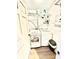 Convenient laundry room with washer, dryer, and shelving at 8104 Glenwillow Ln # 208, Indianapolis, IN 46278