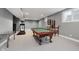 Spacious basement game room with pool table and treadmill at 10295 Summerlin Way, Fishers, IN 46037