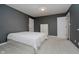 Bedroom with gray walls, carpet, and a white dresser at 10295 Summerlin Way, Fishers, IN 46037