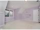 Lavender bedroom with double windows and floating shelves at 10295 Summerlin Way, Fishers, IN 46037