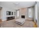 Gathering room with stone fireplace and hardwood floors at 10295 Summerlin Way, Fishers, IN 46037