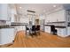 Modern kitchen with white cabinets and granite countertops at 10295 Summerlin Way, Fishers, IN 46037