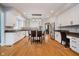 Modern kitchen with white cabinets and granite countertops at 10295 Summerlin Way, Fishers, IN 46037